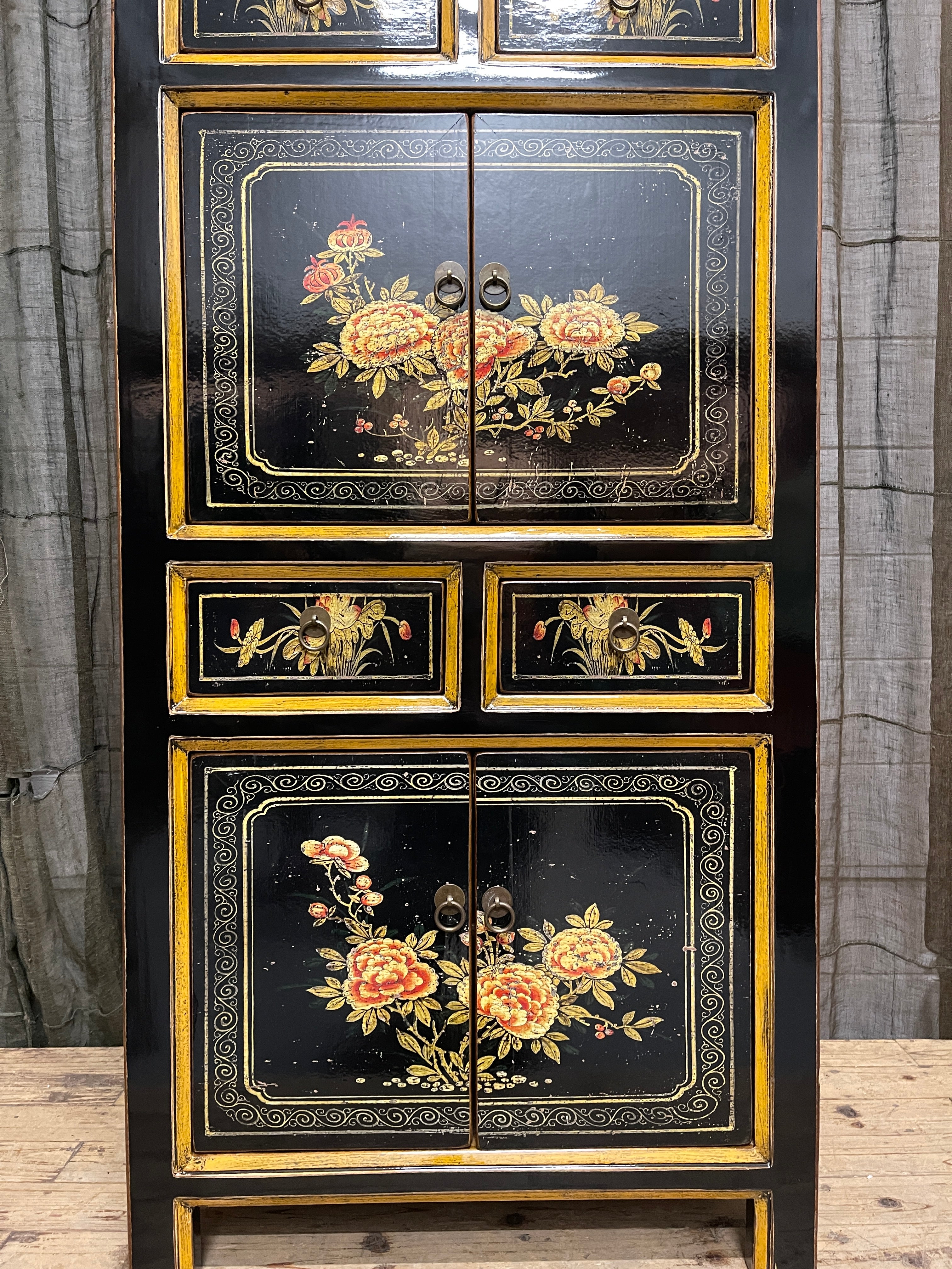 Chinese Black Lacquered Storage Cabinet, Gold Bordered Floral Panels