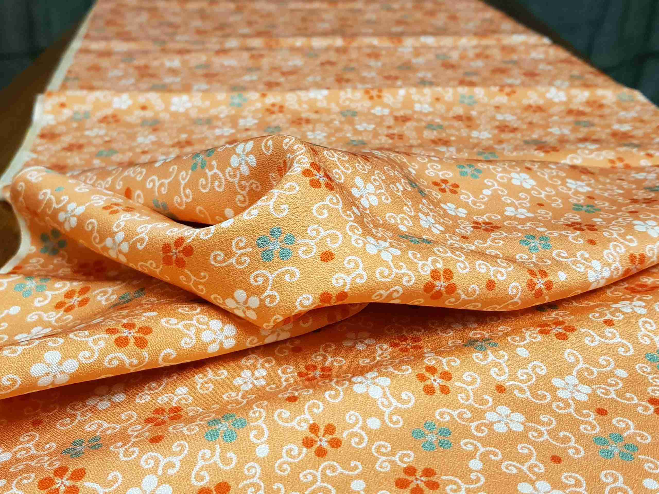 Japanese Silk Fabric, Light Orange with Colourful Blossoms.