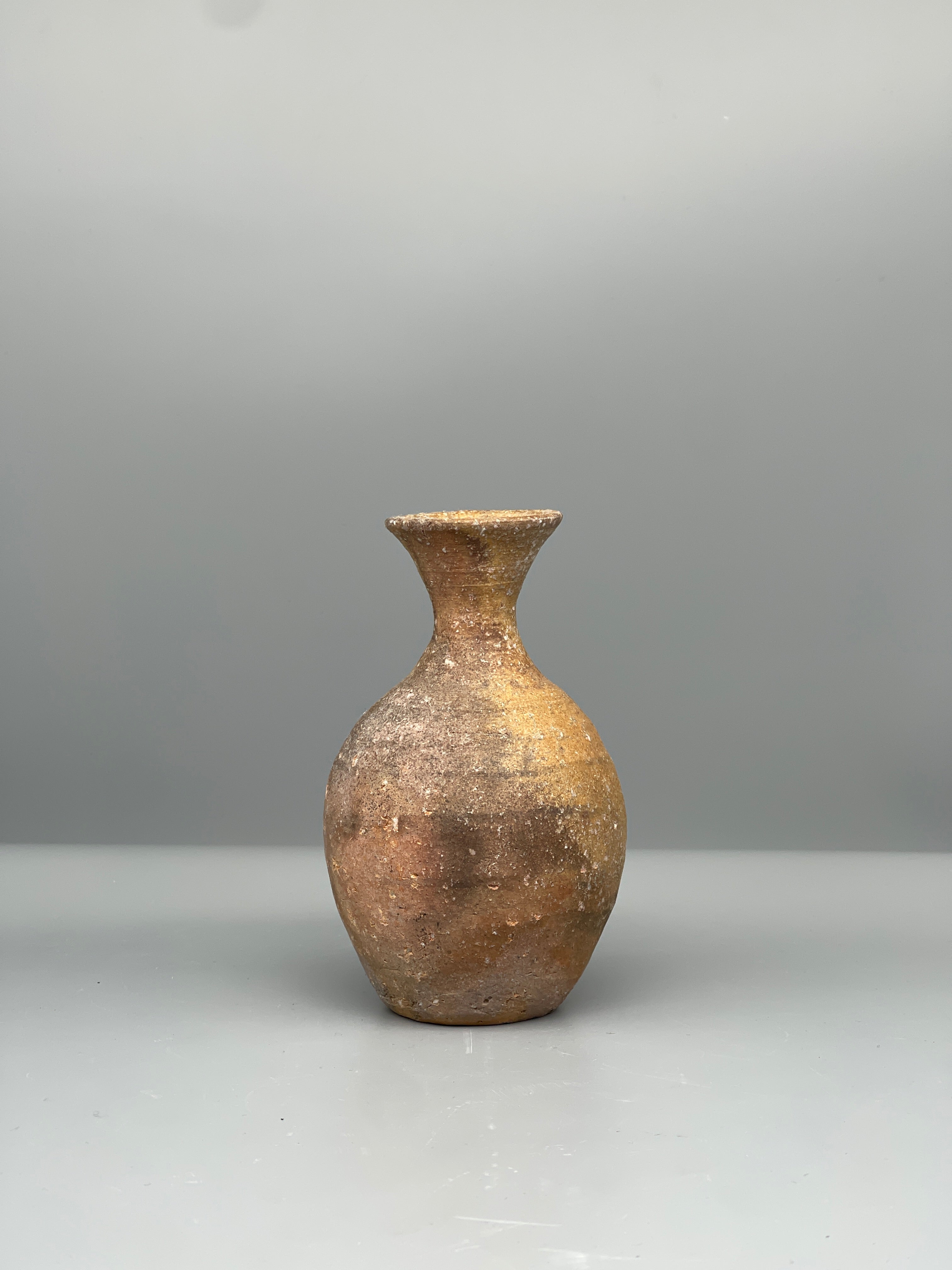Vintage Japanese bizen flask, amber ash glaze, side view
