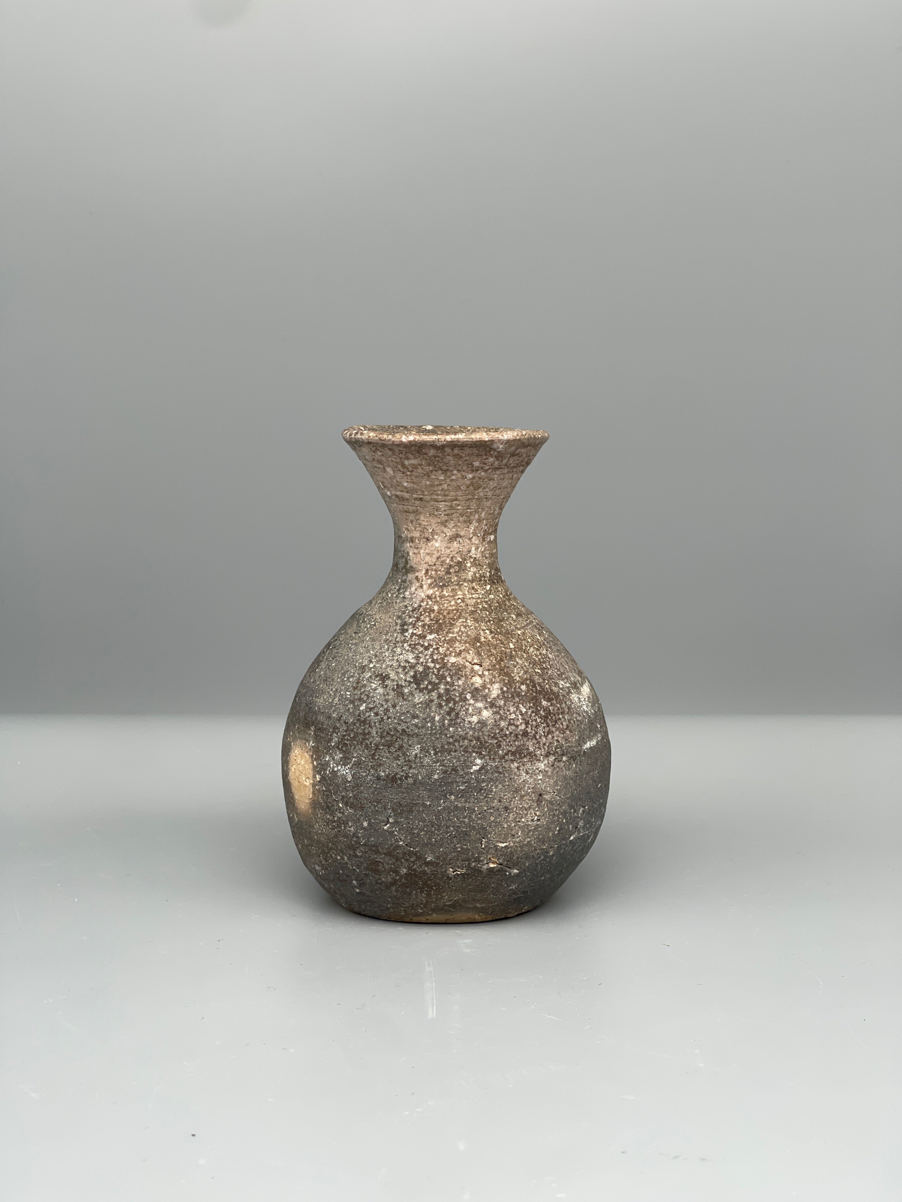 Vintage Japanese bizen flask, grey ash glaze, side view