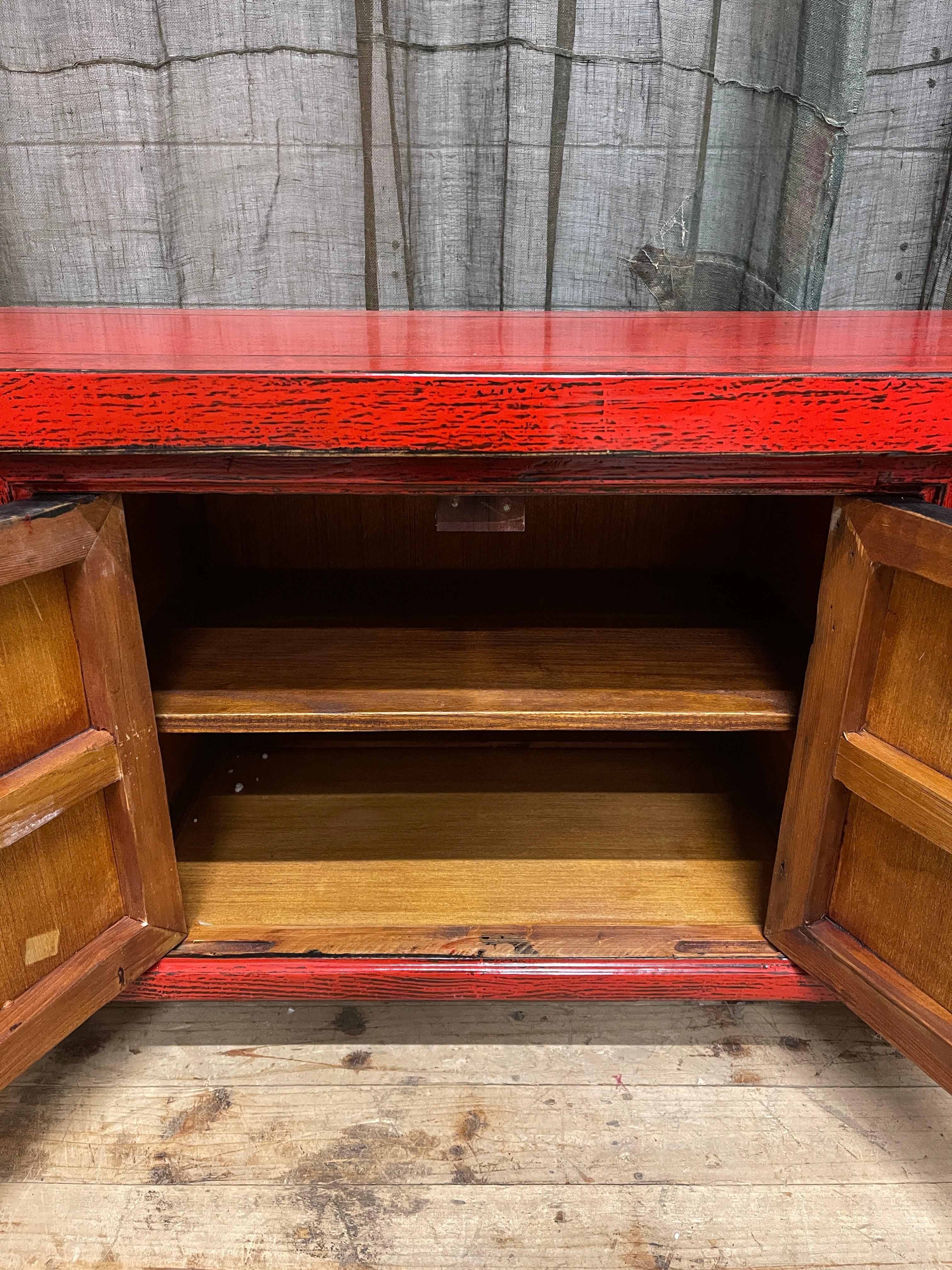 Chinese Red Lacquered Low Cabinet