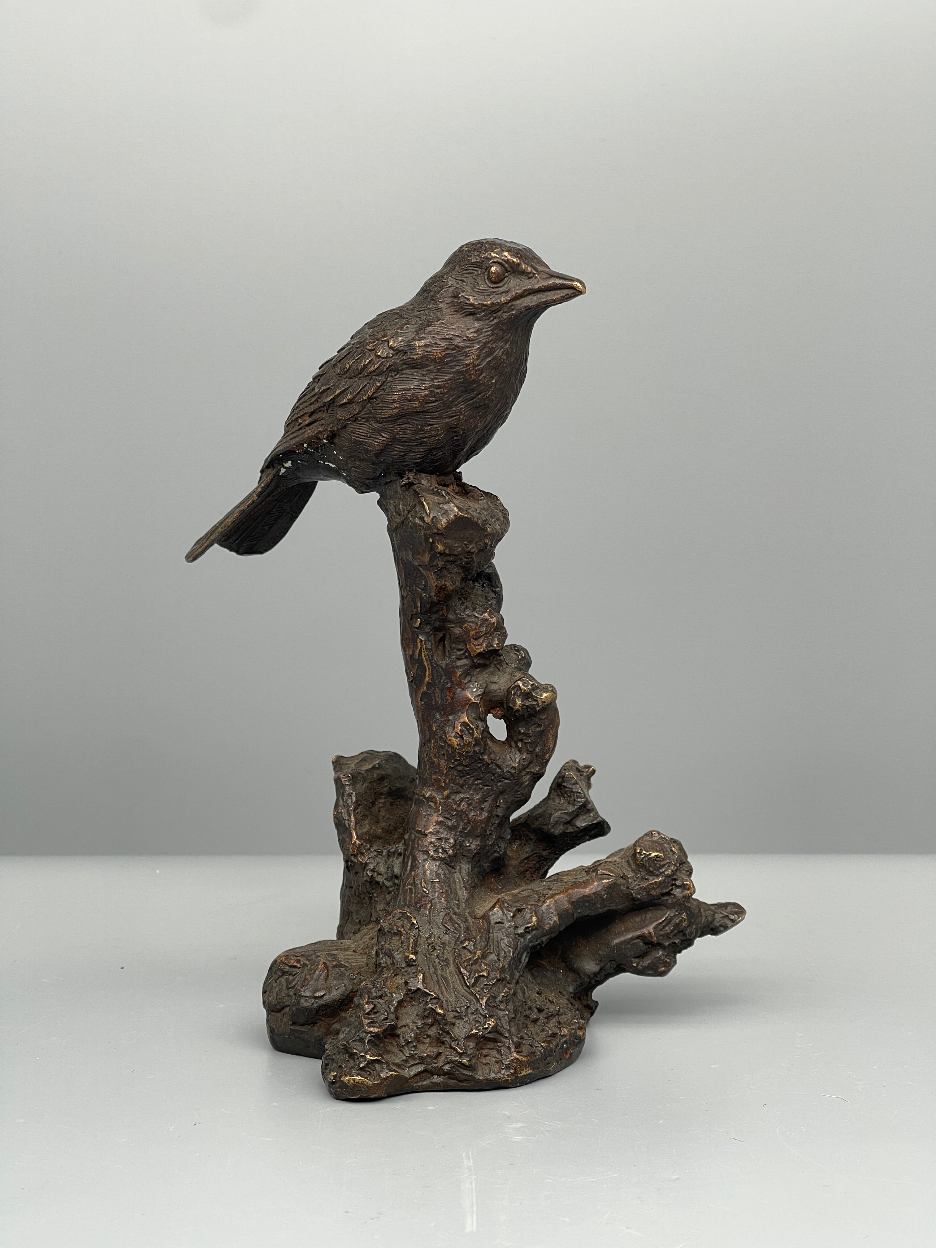 Vintage Japanese bronze bird figure, angled view