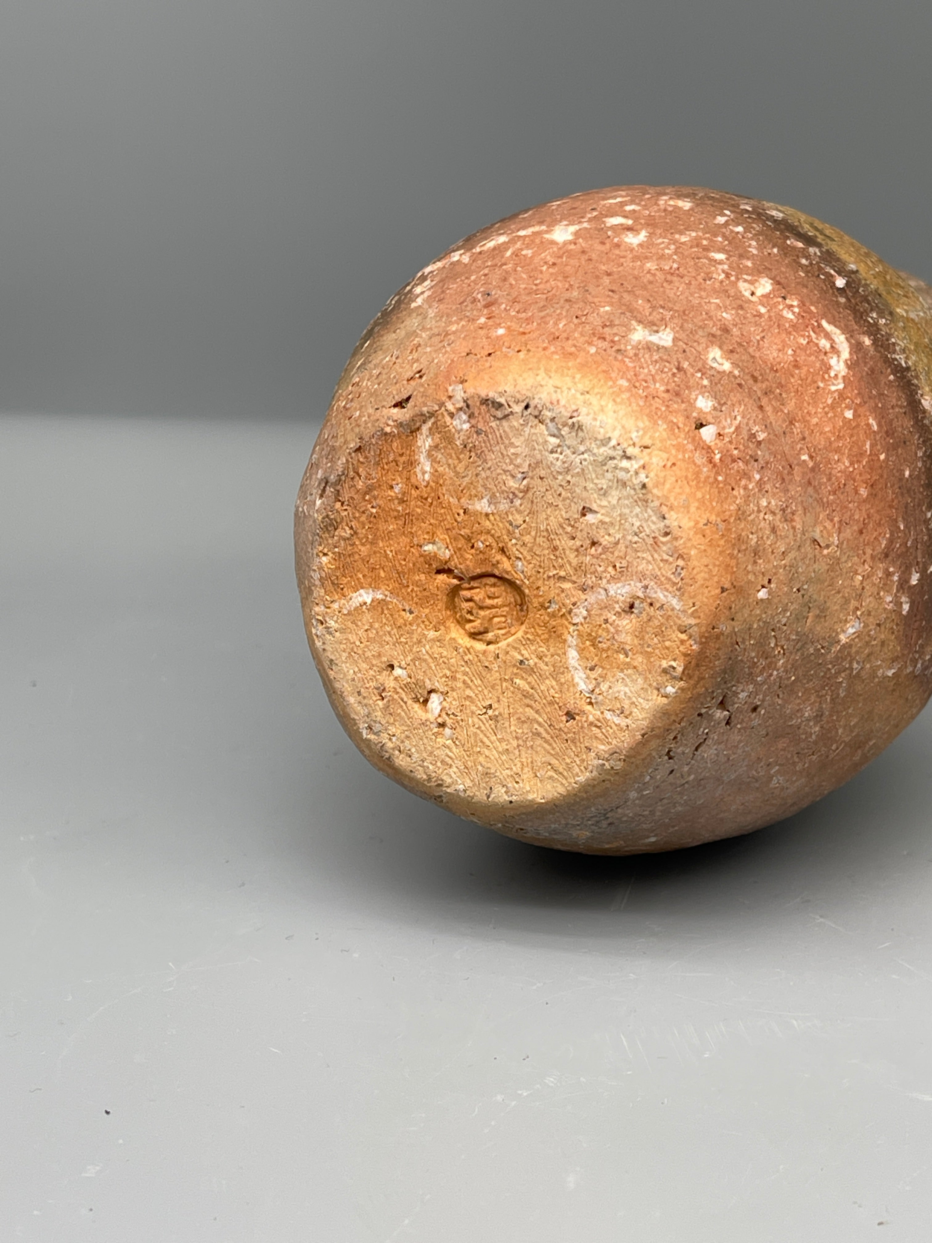 Vintage Japanese bizen flask, amber ash glaze, base with impressed mark
