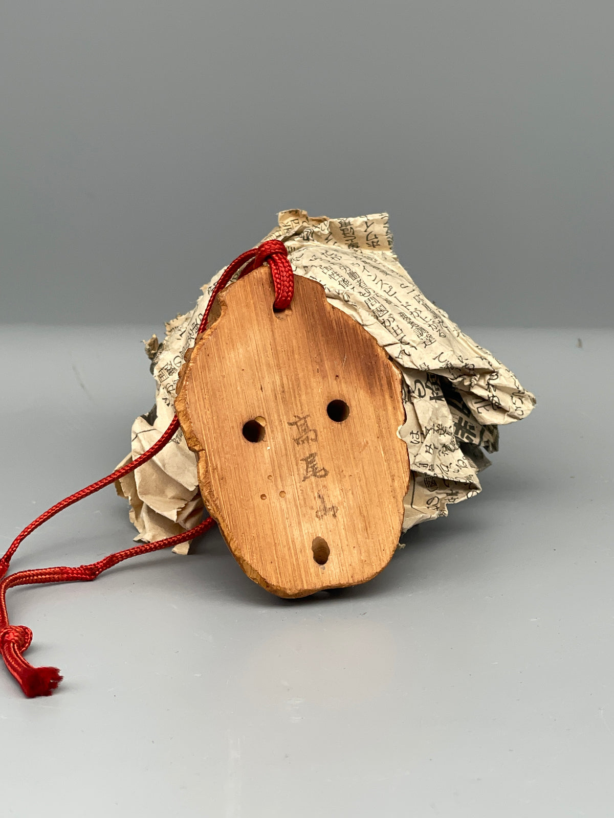 Vintage Japanese carved tengu mask, back view