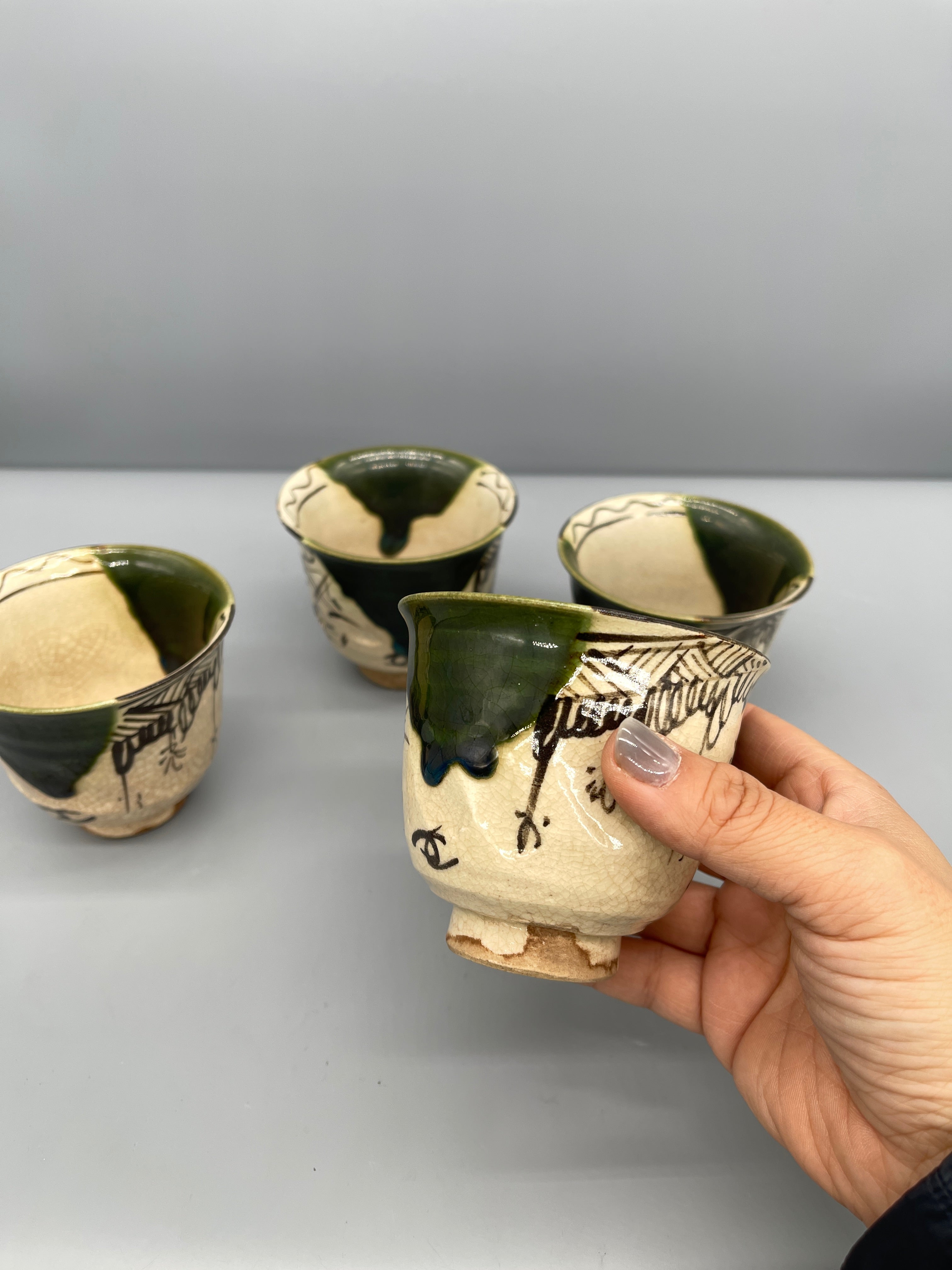A Set Of Vintage Japanese Tea Cups, Green Oribe Glaze