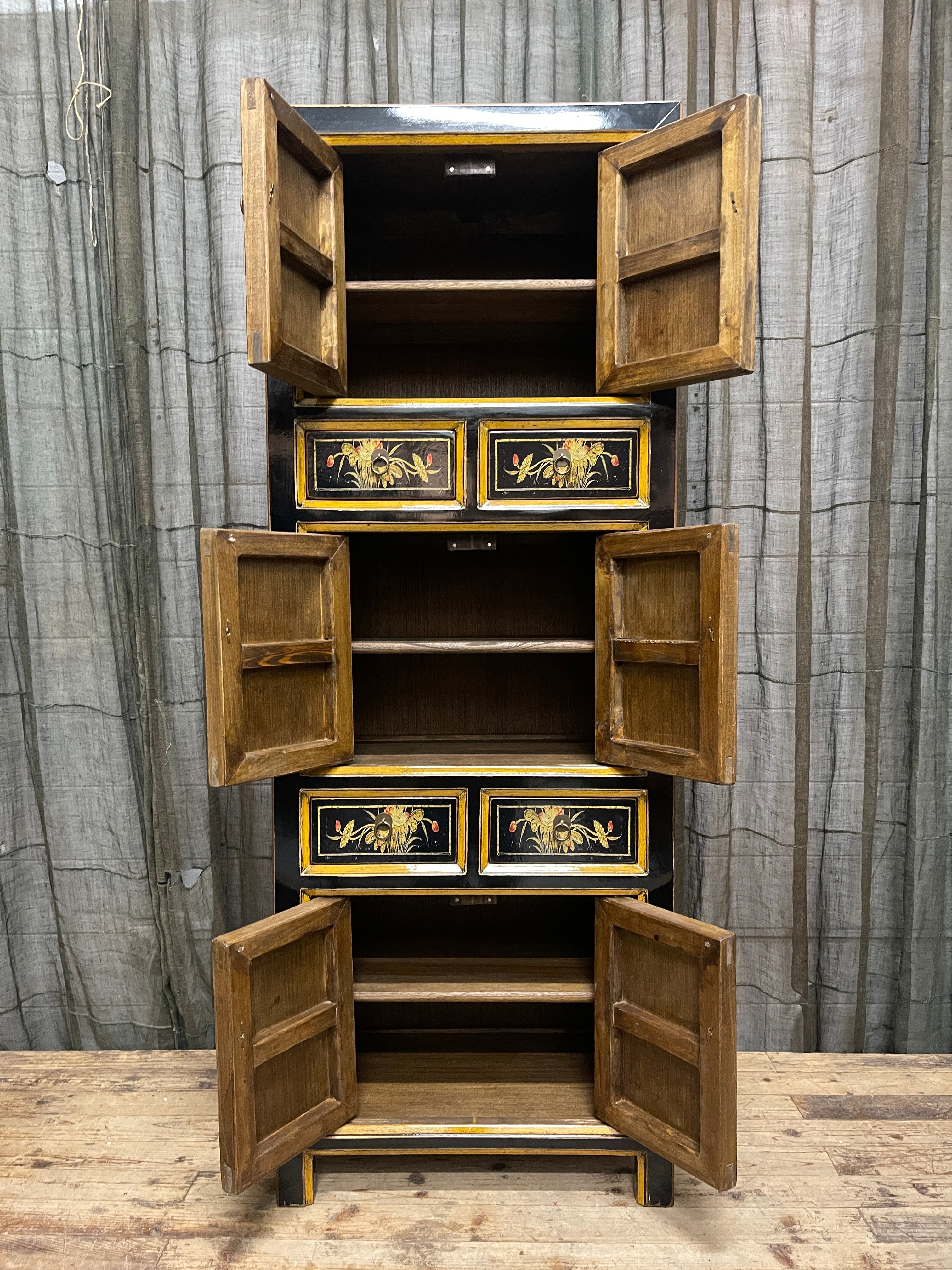 Chinese Black Lacquered Storage Cabinet, Gold Bordered Floral Panels