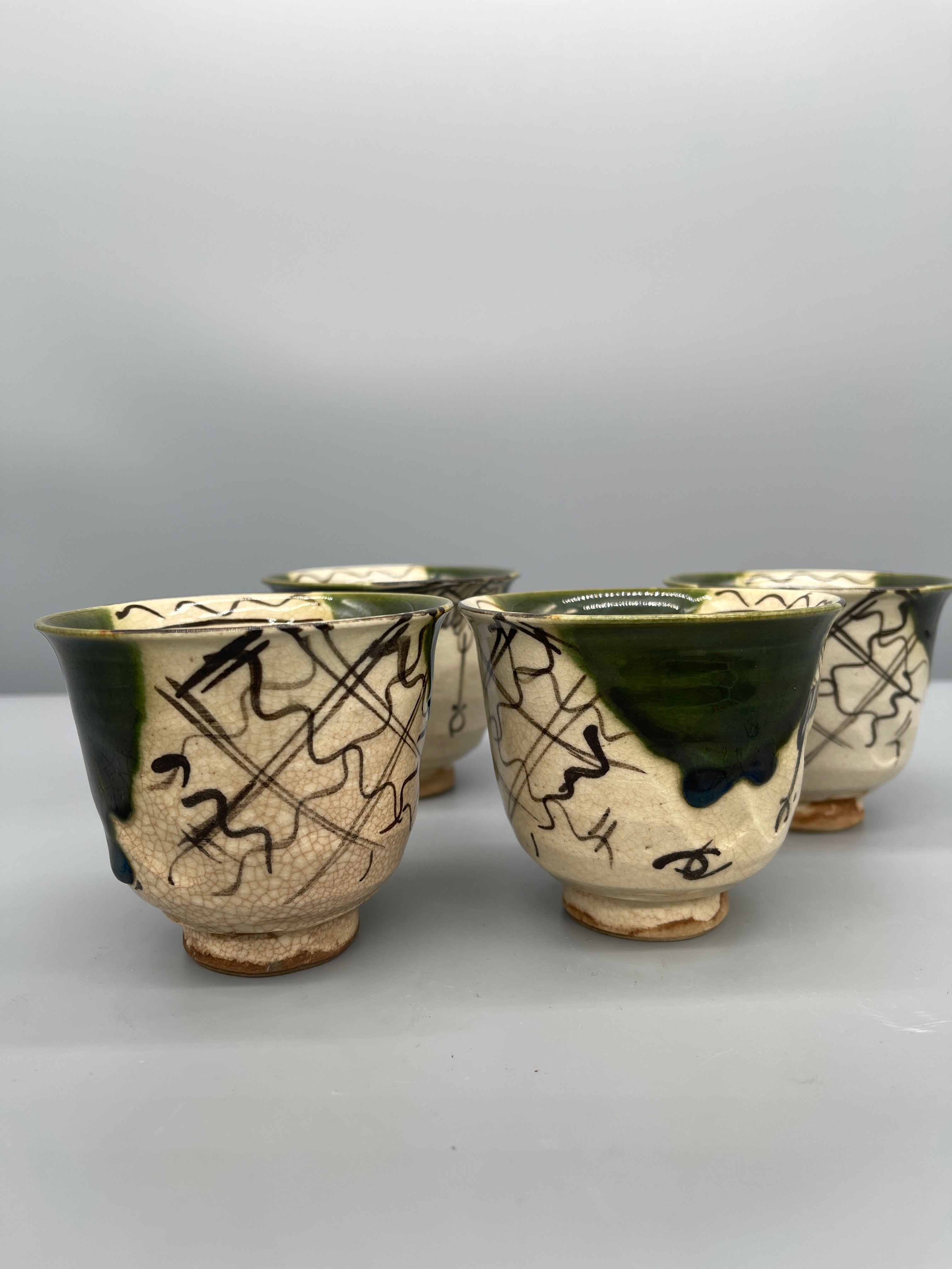 A Set Of Vintage Japanese Tea Cups, Green Oribe Glaze