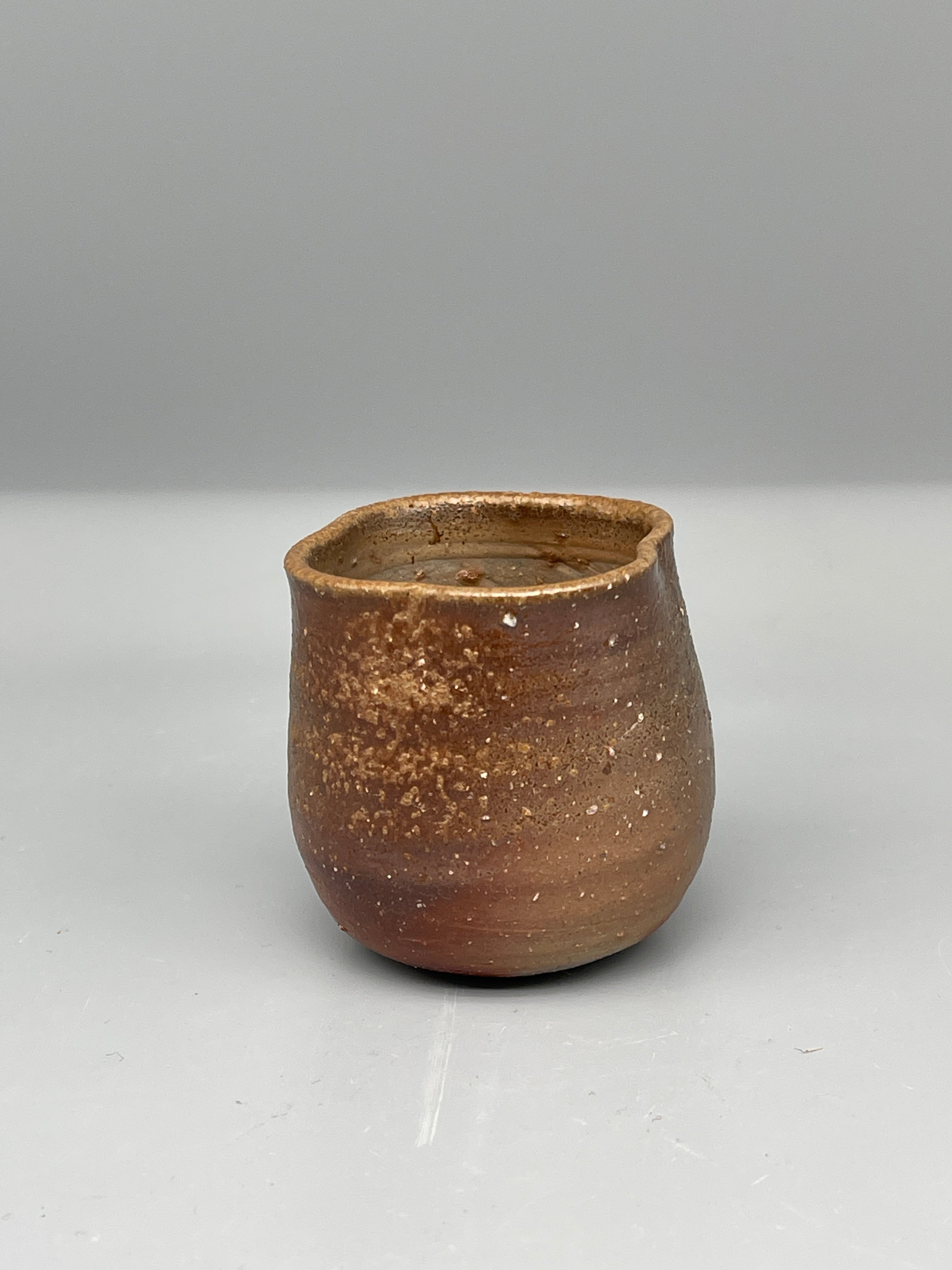 Vintage Japanese bizen guinomi cup, speckled red, interior view