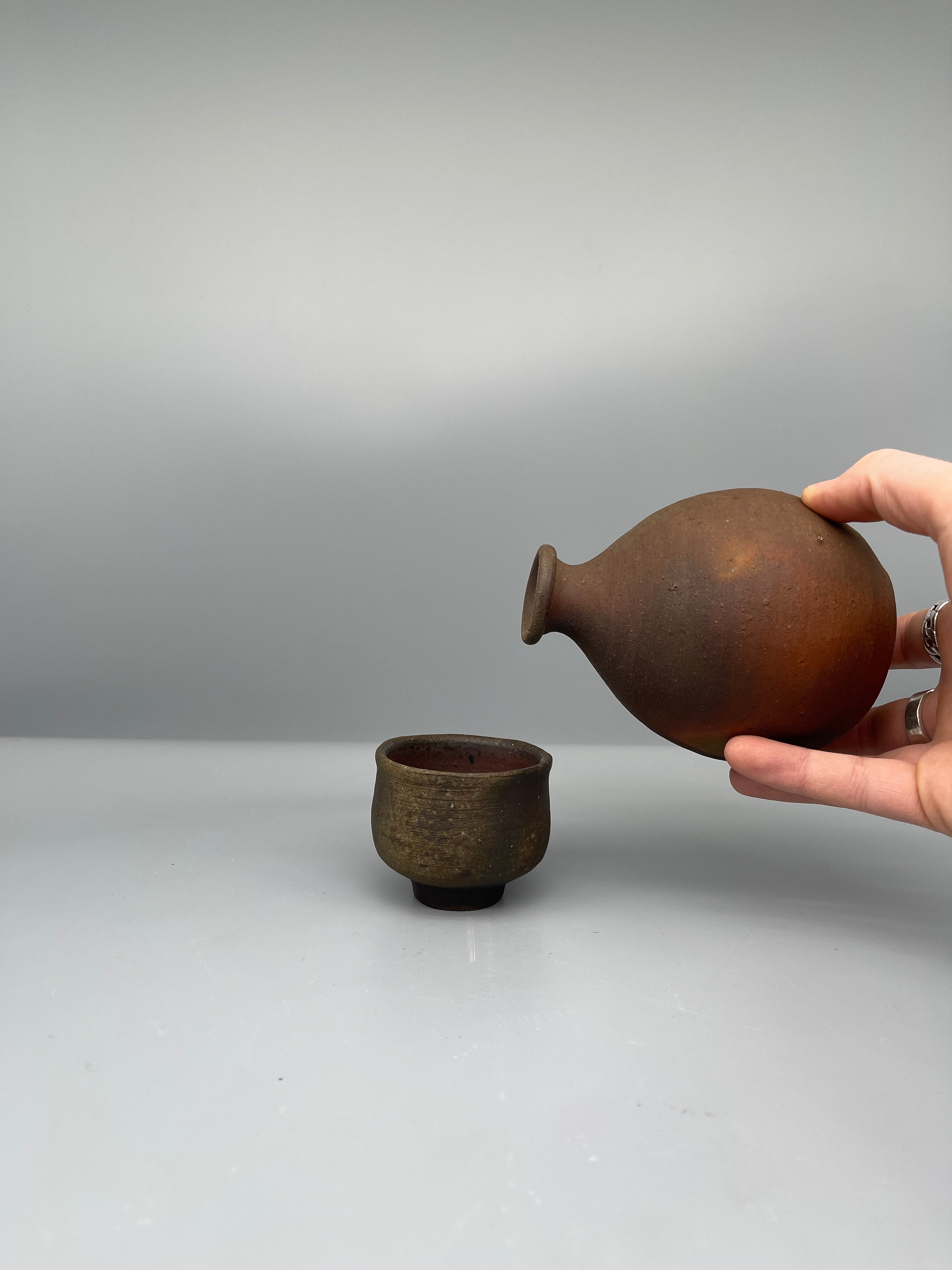 Vintage Japanese bizen sake bottle, close up