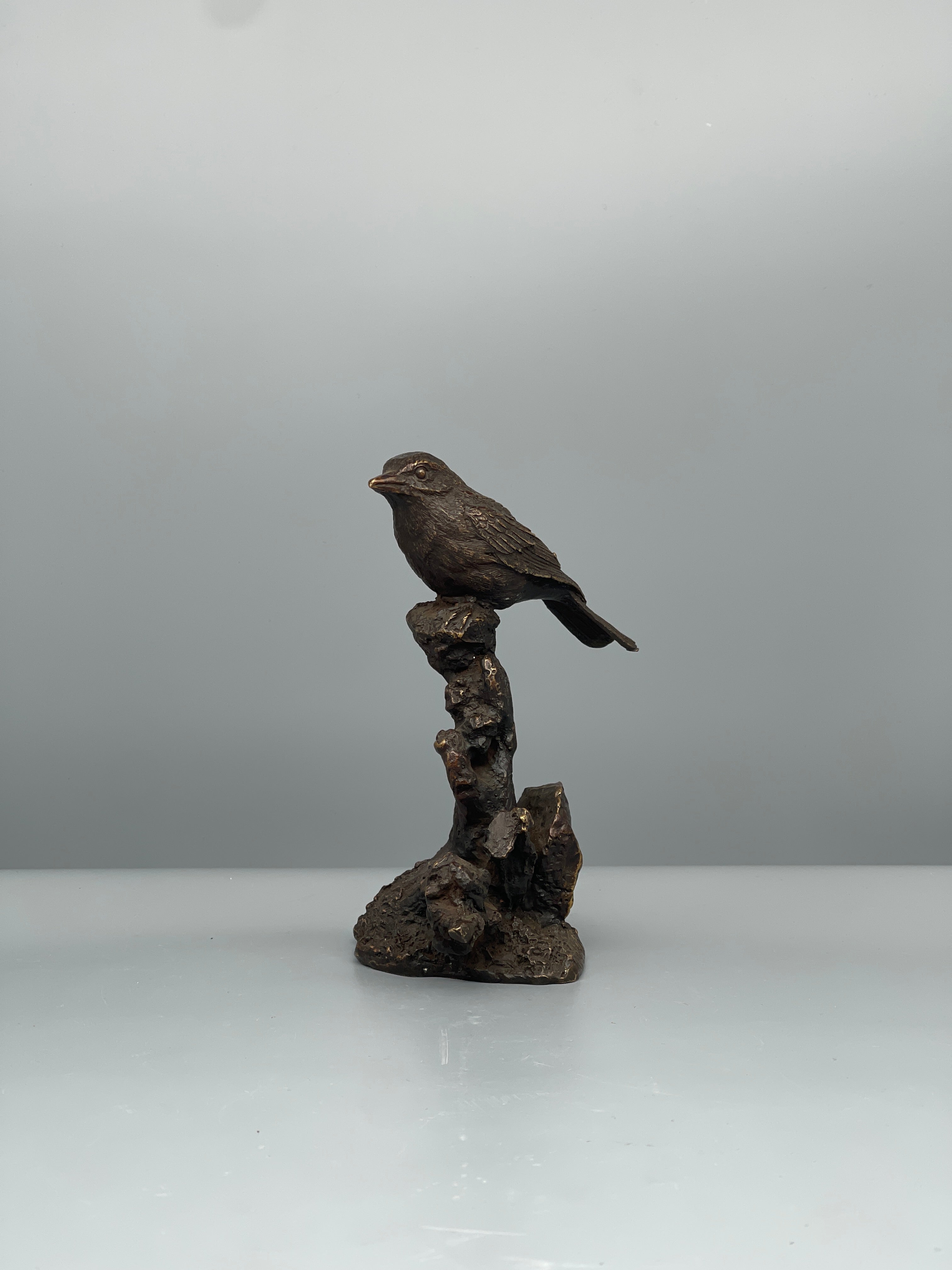 Vintage Japanese bronze bird figure, side view