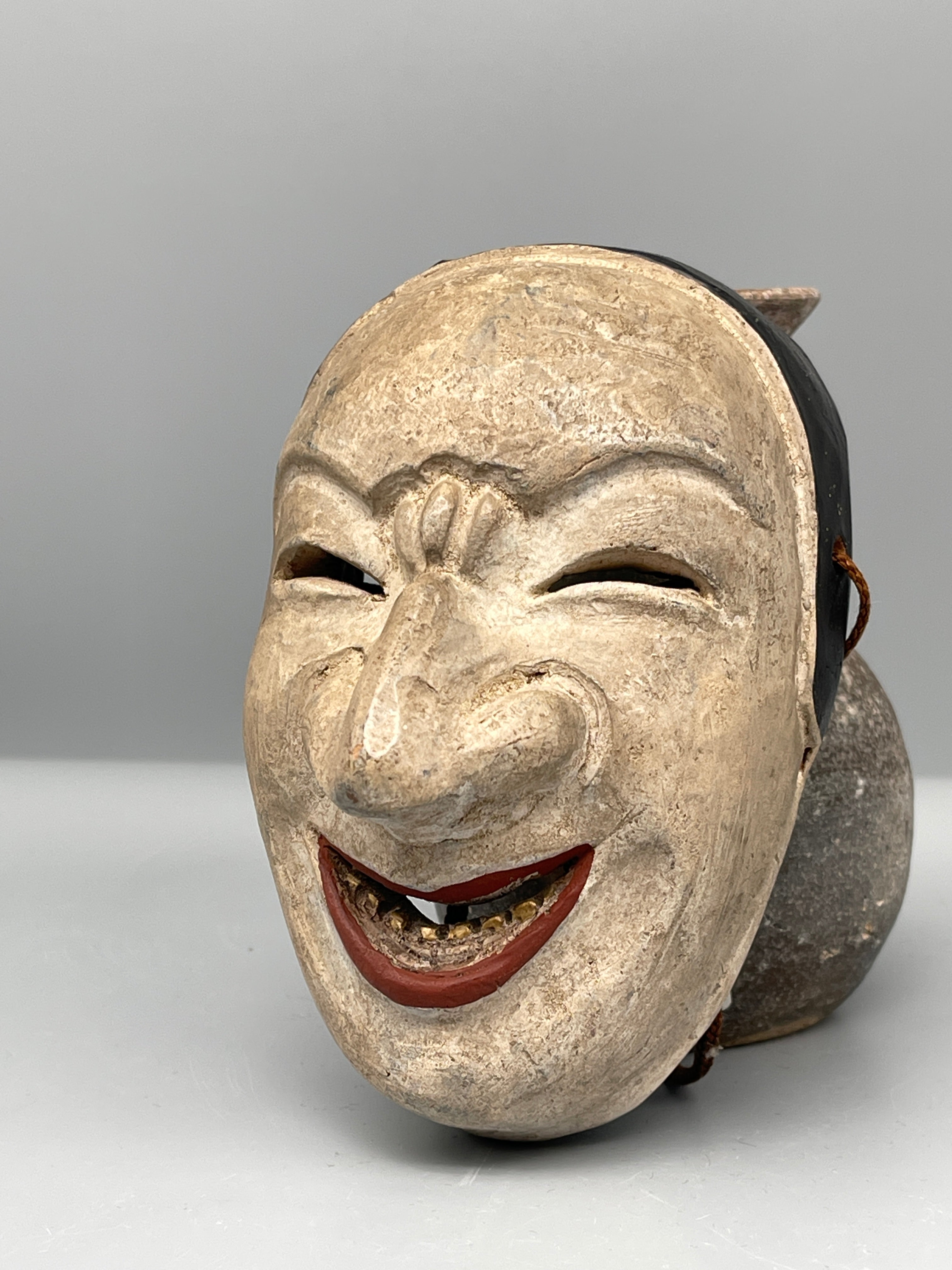Vintage Japanese carved mask, aged finish, detail