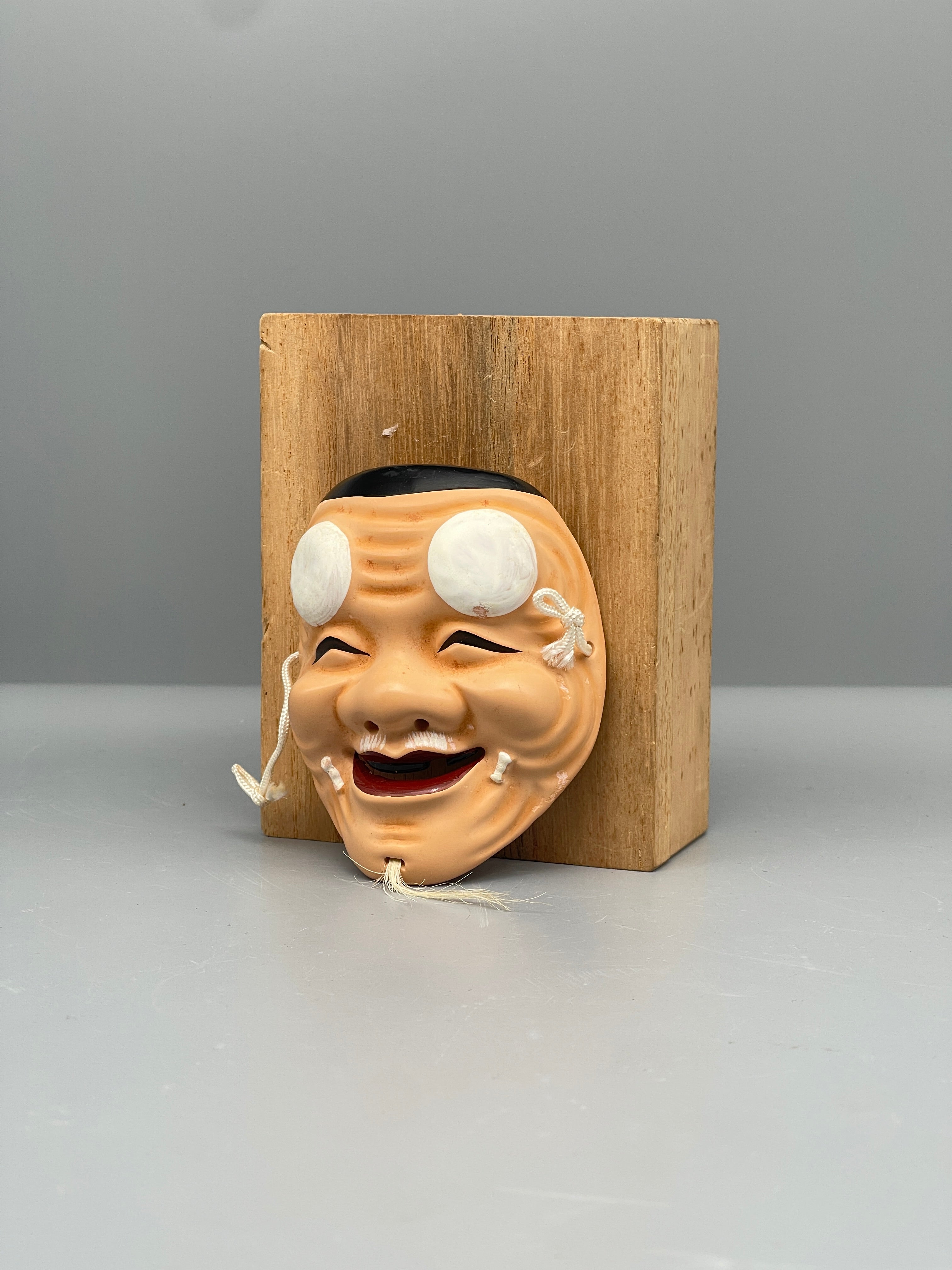 Vintage Japanese carved mask, old man, front view
