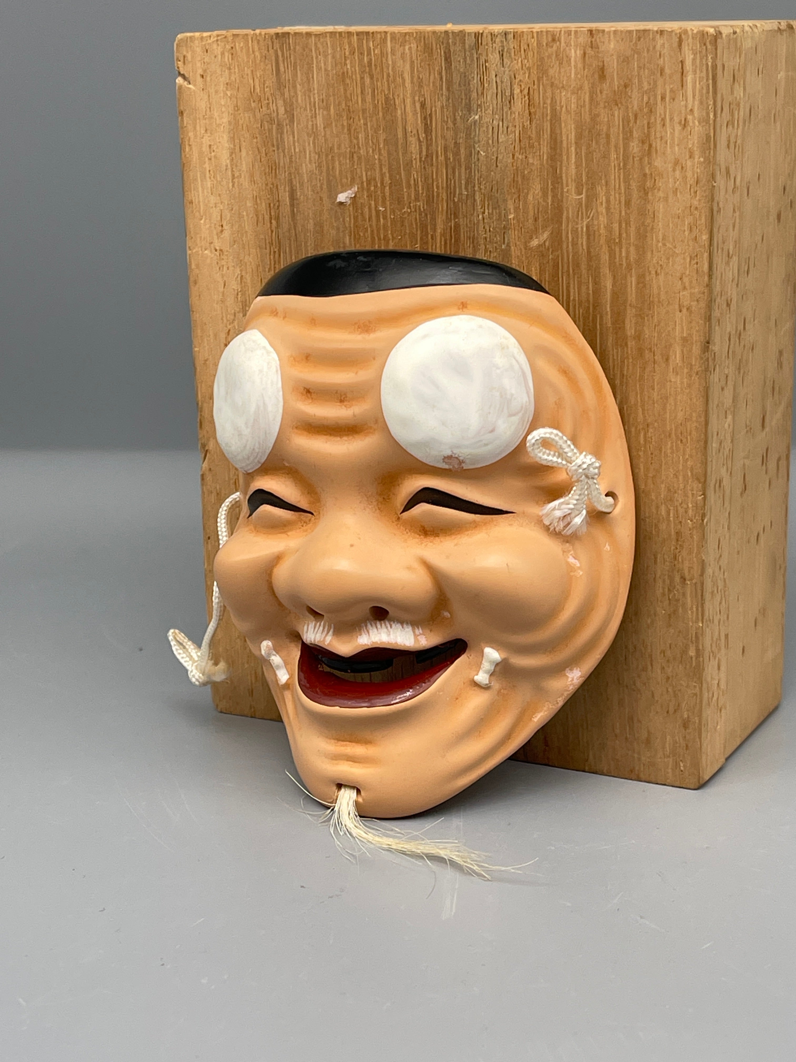 Vintage Japanese carved mask, old man, detail