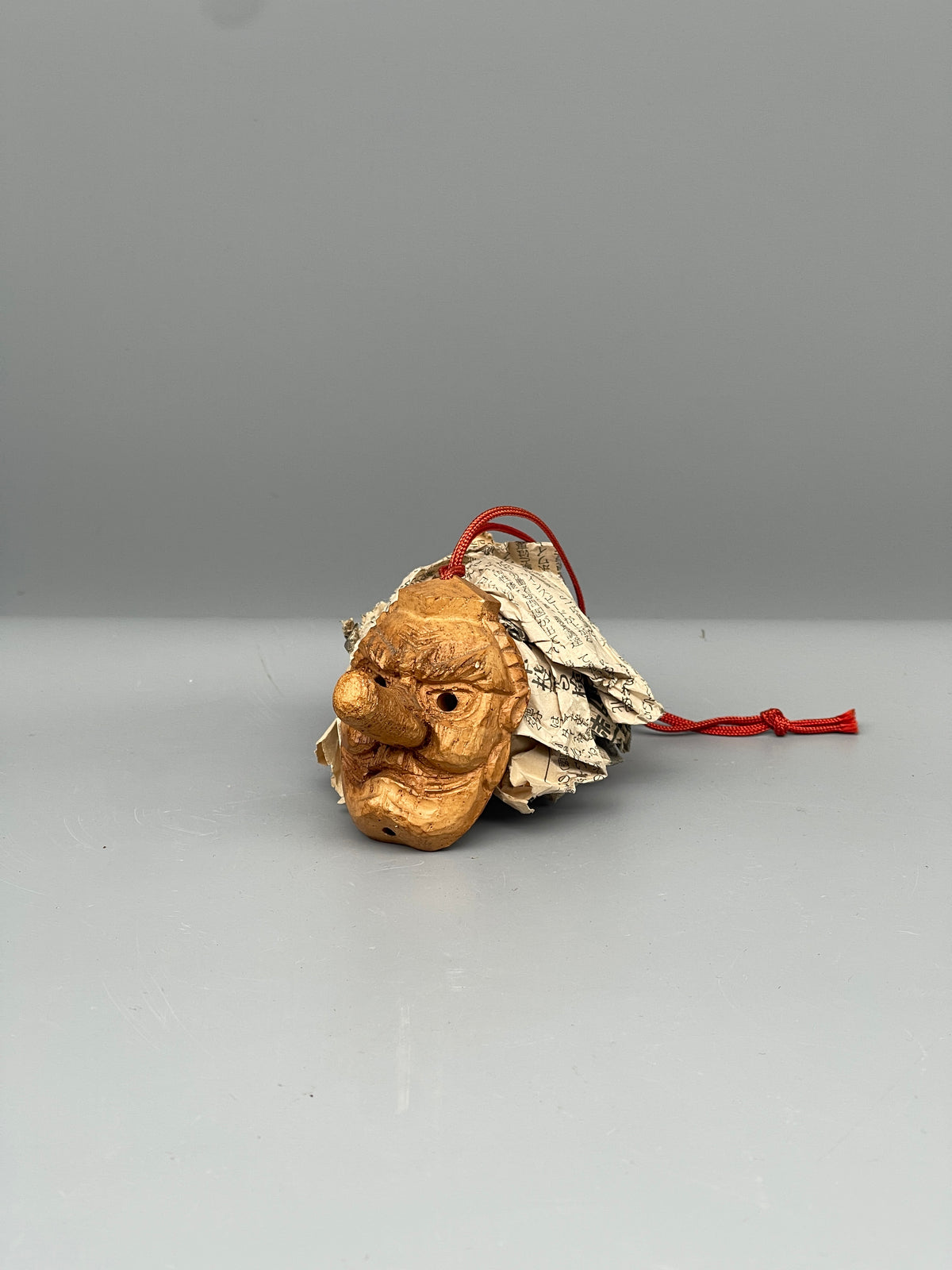 Vintage Japanese carved tengu mask, front view