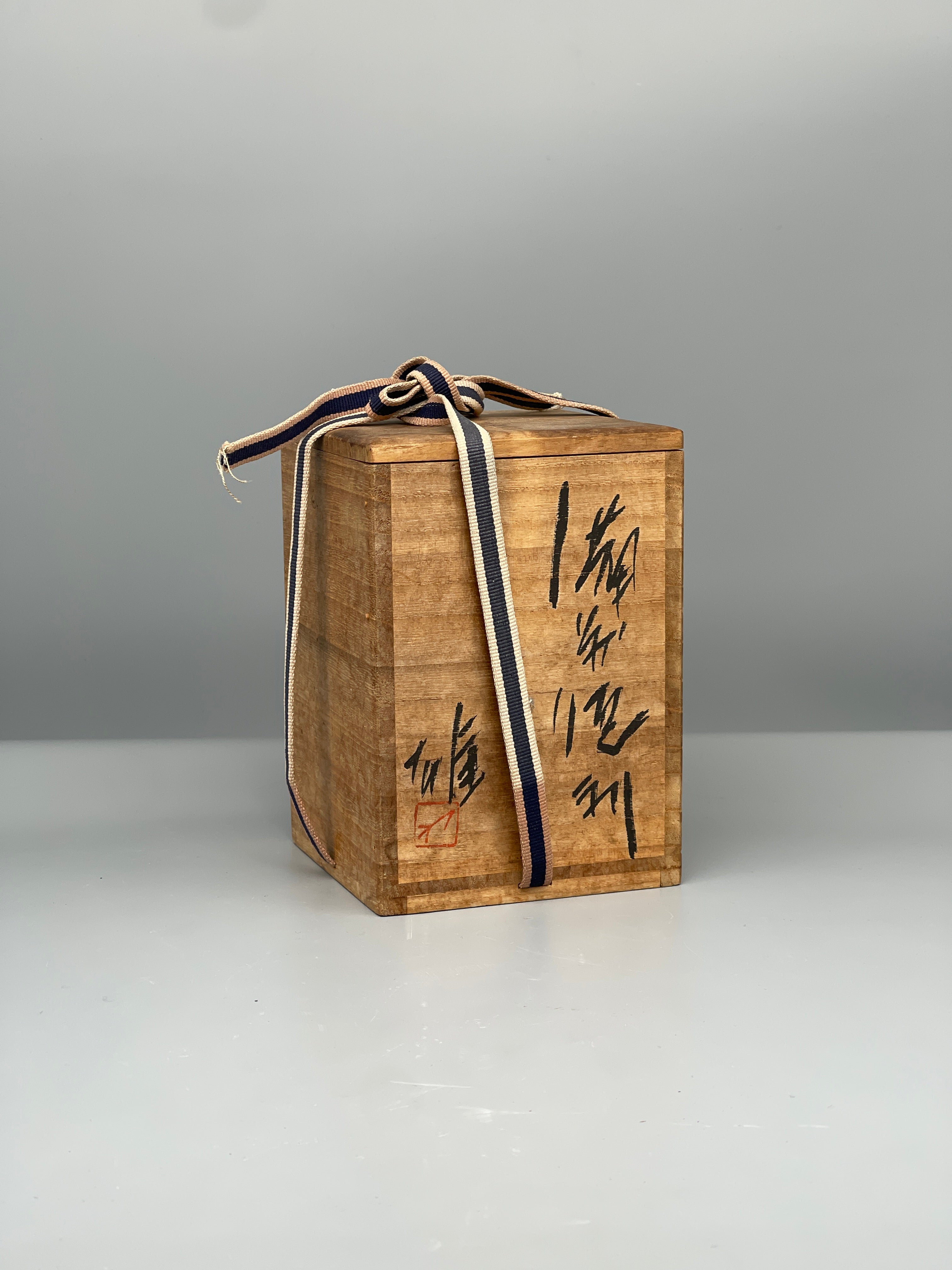 Vintage Japanese bizen sake bottle and cup set, wooden box tied closed
